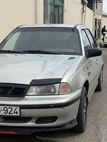 opel astra k: Daewoo Nexia: 1.5 l | 2005 il Sedan — 3