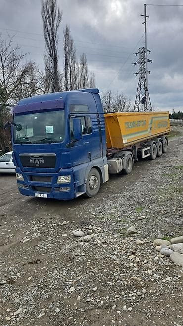 MAN TGA 4x2 traktor + SCHMITZ üçoxlu yarımqoşqu (küpə/kuzov tipli