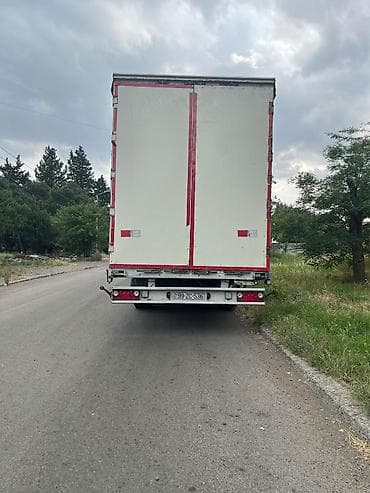 Qoşqular: Tirsan bortlu Mega yarımqoşqu. İli 2008. 3 təkəri yeni 1 təkəri 70 — 3