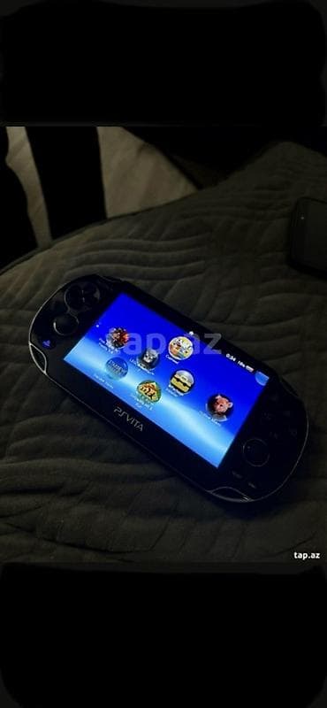 icare ps: Sony PS Vita (PCH-1000 seriyası) daşınan oyun konsolu ( cox seliqeli — 2
