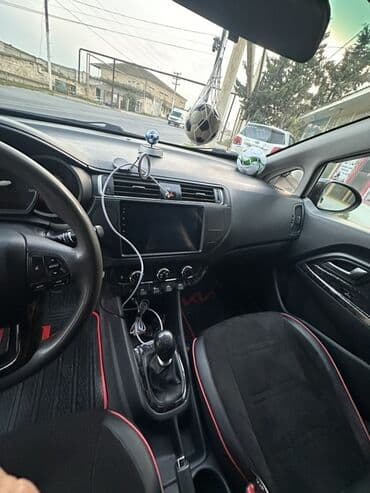 ceşqa maşını: Kia Rio: 1.1 l | 2014 il Hetçbek — 10