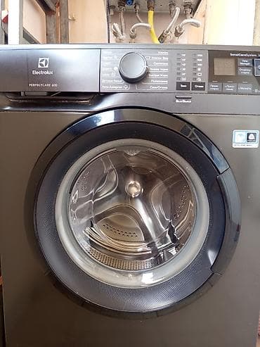 masin aparatura: Electrolux PerfectCare 600 önyükləməli paltaryuyan barabaninda cüzi — 2