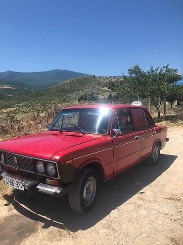 larzon disk: VAZ 2106, qırmızı rəngli, sedan kuzov. Xüsusiyyətlər: - 4 qapı, 5 — 1
