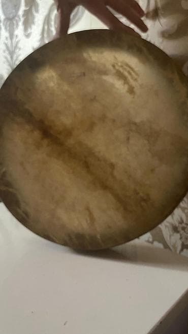 Nəfəs alətləri: Əl nağarası (qaval) – dairəvi çərçivə zərb aləti - Korpus: taxta — 1