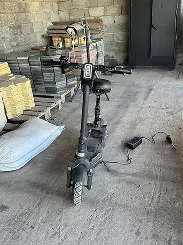 Elektrik skuter – oturacaqlı, güclü asqılı sistemli model — 1