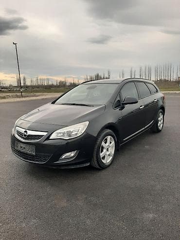 sükan lenti: Opel Astra: 1.4 l | 2011 il 188000 km Universal — 2