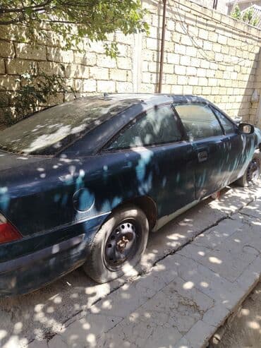 опель зафира а: Opel Calibra: 2 l | 1993 il Kupe — 1