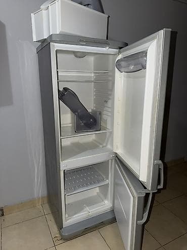 mini soyuducu: İki bölməli soyuducu 2ci əl satılır. Soyuducu gümüşü rəngdədir və — 2