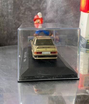 metbex tavan modelleri: Коллекционная модель Mercedes-Benz 190E 2.3 16V W201 gold 1984 EDICOLA — 12