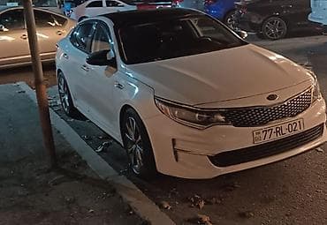 zil radiatoru: Kia Optima – ağ rəngli, zərif və dinamik sedan. Xüsusiyyətlər: - — 2