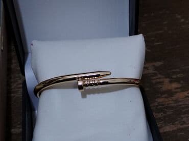 Kişi Geyimləri: Qızılı rəngdə zərif qolbaq dəsti - Model: 2 ədəd sərt (briqet) qolbaq — 2