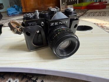 mini fotoaparat qiymetleri: Zenit TTL markalı qara rəngdə kamera. Bu kamera əl ilə fokuslanma və — 4