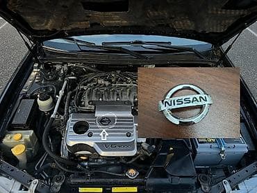 avto.az: Nissan Maxima mühərrik qapağı üçün orijinal “NISSAN” emblem. - — 1