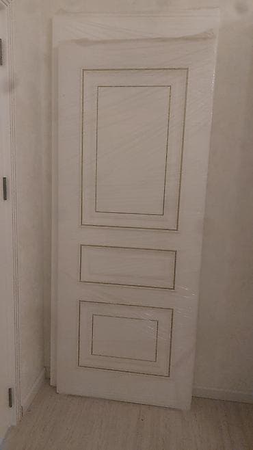 Ağ rəngli klassik üslubda otaq qapılari 2 eded tezedir elave melumat