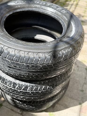masin bezedilmesi: Şin Dunlop 265 / 65 / R 17 — 1