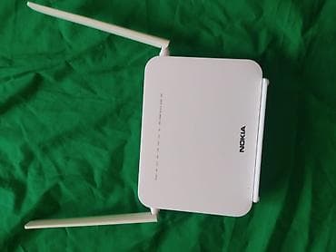 mobil internet modem: Model: Nokia G-1425G-B İşlək vəziyyətdədir. Metal korpusu açılıb — 1