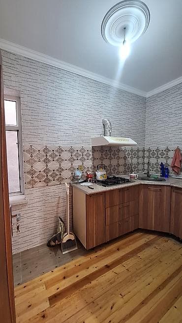 Daşınmaz əmlak: 3 otaqlı mənzil – geniş zal, iki yataq otağı və ayrı mətbəx — 3