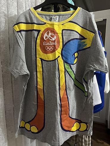 Məhsul: Rio 2016 rəsmi Olimpiya T‑şörtü – “Vinicius” maskotu temalı -