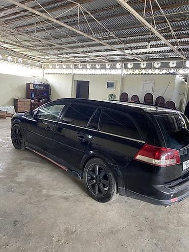 xırdalan heyet evi kiraye: Qara rəngli universal opel vektra(station wagon) avtomobil Yaxsi — 4