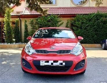 ilkin odenis 2000 azn olan masinlar: Kia Rio hatchback – parlaq qırmızı rəngli, kompakt və şəhər üçün ideal — 2