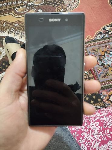 telfon ekranı: Sony 16 GB, rəng - Qara, Sensor — 1
