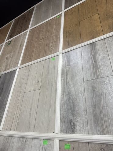 Divar kağızları, oboy: Məhsul: Laminat döşəmə panelləri (od ağacı teksturalı) Təsvir: - — 2