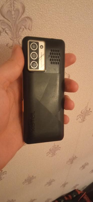 mabil telefon: KGTEL K1803 düyməli telefon Xüsusiyyətlər: - Kompakt korpus, böyük və — 2