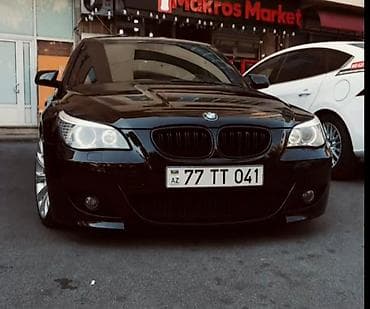 vaz 31 10: BMW 5 Series sedan (E60) – qara rəngli, şəhər üslubunda idman — 1