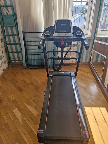 ems trainer: Evdə idman üçün nəzərdə tutulmuş qaçış bandı. Bu cihaz qara rəngdədir — 4