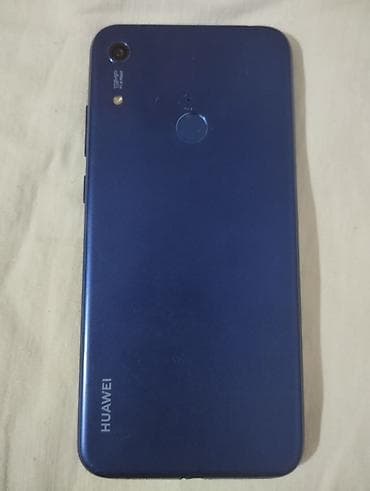 telefon: Huawei smartfon (mavi korpus) Xüsusiyyətlər: - Arxa barmaq izi — 1