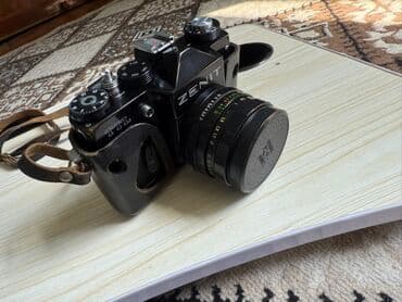 mini fotoaparat qiymetleri: Zenit TTL markalı qara rəngdə kamera. Bu kamera əl ilə fokuslanma və — 5