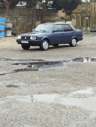 tofas mostu satilir: Model: Tofas Şahin/Doğan seriyası (sedan) Kuzov: 4 qapılı, tünd göy — 3