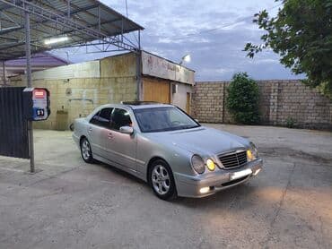 w210 kompressor: Mercedes-Benz E 220: 2.2 l | 2002 il Sedan — 6