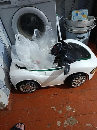 Uşaq dünyası: Uşaq elektromobili – kabriolet dizayn - Rəng: ağ/qara detallarla — 2
