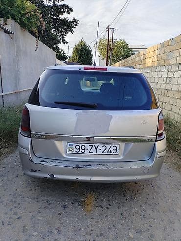 audi a4 ehtiyat hisseleri: Opel Astra Caravan (universal) – gümüşü rəng - Kuzov: universal — 10