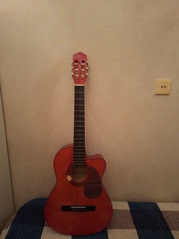 Gitaralar: Klassik gitara üzərində cüzi boya söküyü var problem yartamır heç cür — 1