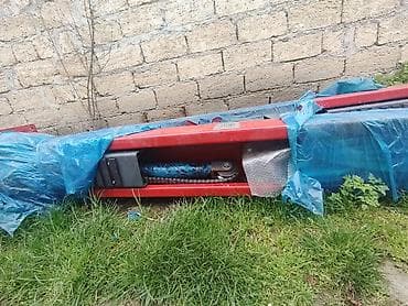 permanent aparati satisi: İki dirəkli avtomobil qaldırıcı Model: UE-2P4T (lövhədə qeyd olunub) — 2