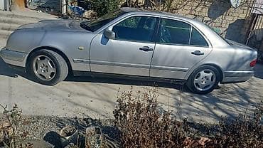 mercedes 2.0 dizel motor: Mercedes-Benz E 200 (W210) sedan - Kuzov: 4 qapılı sedan, gümüşü rəng — 2