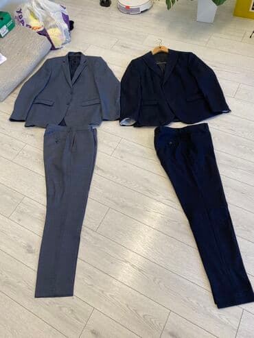 kişi ucun klassik qara kostyum: Şəkillərdə iki kişi kostyumu təqdim olunur. Biri boz rəngdə, digəri — 1