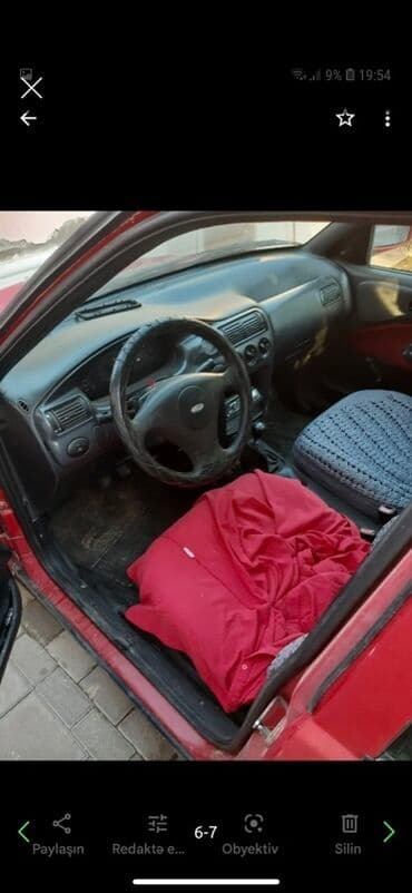 ruçnoy nə deməkdir: Satılır – Qırmızı rəngdə sedan avtomobil Model və görünüş: - Korpus — 3