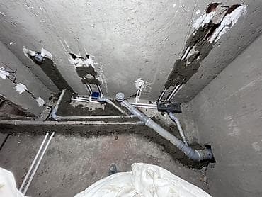 Ремонтные работы: Xidmət: Suvaq altı santexnika və isti döşəmə (su əsaslı) — 2