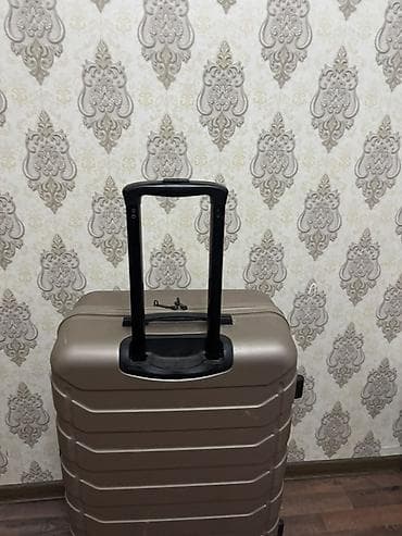 Книги и журналы: Gino Rossi sərt korpuslu çamadan - Rəng: qəhvəyi/bronza - Material — 3