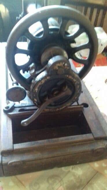 qədimi qəpiklər: Singer tikiş maşını.1904 -cü il ictehsalı.Üstündə seriya nömrəsi — 6