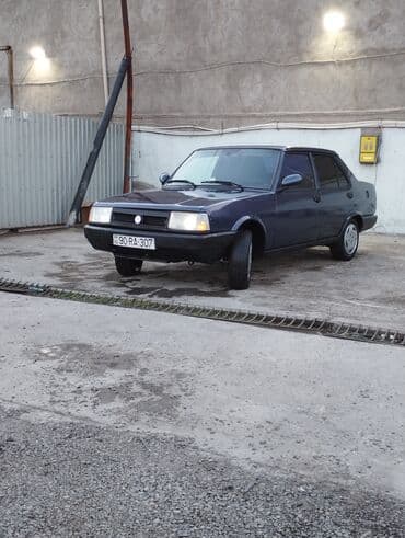 tofas mostu satilir: Model: Tofas Şahin/Doğan seriyası (sedan) Kuzov: 4 qapılı, tünd göy — 1