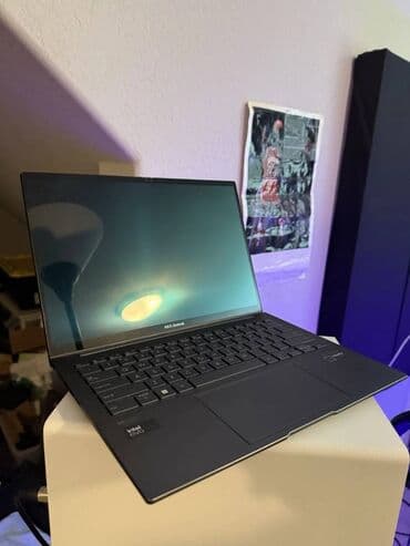 noutbuklar işlənmiş: ASUS ZenBook 14 OLED - Korpus: boz alüminium gövdə, nazik çərçivələr — 1
