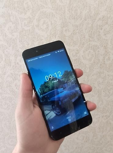 redmi mi a1: Xiaomi Mi A1, 64 GB, rəng - Qara, 
 Sensor, Barmaq izi, İki sim kartlı — 1