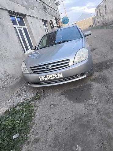 cd disklər: Nissan Teana – gümüşü sedan Xüsusiyyətlər: - Korpus: 4 qapılı sedan — 1