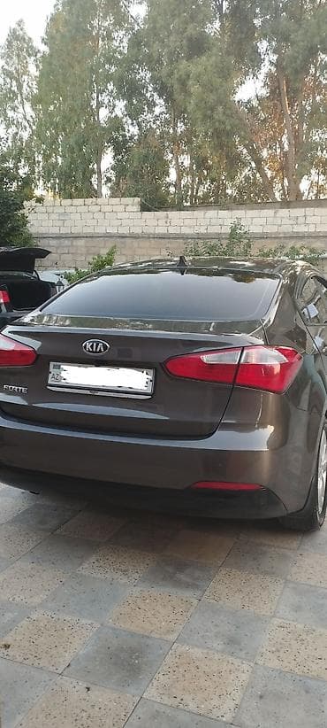 авто руль: Kia Forte: 1.8 л | 2013 г. Седан — 7