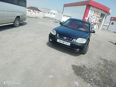 ij diski: Hyundai Accent sedan Xüsusiyyətlər: - Korpus: 4 qapılı sedan - Rəng — 7