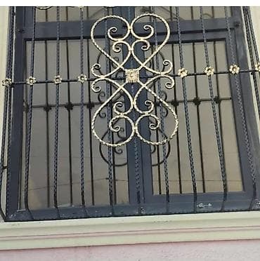 Dekorativ və təhlükəsizlik məqsədli dəmir işləri – pəncərə